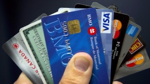 Credit cards are displayed in Montreal, Wednesday, December 12, 2012. Equifax Canada says total consumer debt rose to $2.32 trillion in the second quarter, up 8.2 per cent compared with the same quarter last year. THE CANADIAN PRESS/Ryan Remiorz