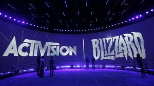 FILE - The Activision Blizzard Booth is shown on June 13, 2013, during the Electronic Entertainment Expo in Los Angeles. Microsoft’s plan to buy video game giant Activision Blizzard for $68.7 billion could have major effects on the gaming industry, transforming the Xbox maker into something like a Netflix for video games by giving it control of many more popular titles. But to get to the next level, Microsoft must first survive a barrage of government inquiries from various countries. An upcoming decision from the United Kingdom to close or escalate its antitrust probe is expected Thursday, Sept. 1, 2022. (AP Photo/Jae C. Hong, File)