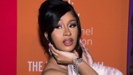 FILE - Cardi B appears at the 5th annual Diamond Ball benefit gala at Cipriani Wall Street in New York on Sept. 12, 2019. The Grammy-winning rapper resolved a yearslong criminal case stemming from a pair of brawls at New York City strip clubs by pleading guilty Thursday in a deal that requires her to perform 15 days of community service. (Photo by Mark Von Holden/Invision/AP, File)
