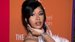 FILE - Cardi B appears at the 5th annual Diamond Ball benefit gala at Cipriani Wall Street in New York on Sept. 12, 2019. The Grammy-winning rapper resolved a yearslong criminal case stemming from a pair of brawls at New York City strip clubs by pleading guilty Thursday in a deal that requires her to perform 15 days of community service. (Photo by Mark Von Holden/Invision/AP, File)