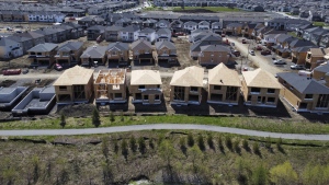 New homes are built in a housing construction development in the west-end of Ottawa on Thursday, May 6, 2021. Canada Mortgage and Housing Corp. says the annual pace of housing starts in August slowed compared with July. THE CANADIAN PRESS/Sean Kilpatrick