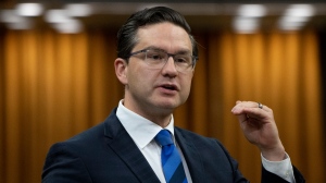 Conservative leader Pierre Poilievre rises during Question Period, Tuesday, Sept. 20, 2022 in Ottawa. THE CANADIAN PRESS/Adrian Wyld