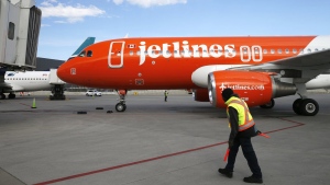 A Canada Jetlines Airbus A320 jet pulls up to the Calgary airport gate on the airline's inaugural flight at Calgary, Alta., Thursday, Sept. 22, 2022. THE CANADIAN PRESS/Larry MacDougal