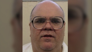 FILE - This undated photograph provided by the Alabama Department of Corrections shows inmate Alan Eugene Miller, who was convicted of capital murder in a workplace shooting rampage that killed three men in 1999. Miller, scheduled to be put to death by lethal injection on Sept. 22, 2022, says the state lost the paperwork he turned in selecting an alternate execution method. (Alabama Department of Corrections via AP, File)