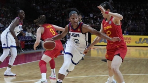 United States' Alyssa Thomas pushes past China's Pan Zhenqi, right, during their game at the women's Basketball World Cup in Sydney, Australia, Saturday, Sept. 24, 2022. (AP Photo/Mark Baker)