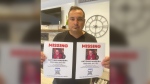 Antonio Madeira's son, Michael Madeira, holds posters of his father that have been plastered throughout Toronto since the elderly west Toronto resident went missing on July 12.