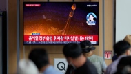 FILE - A TV screen showing a news program reporting about North Korea's missile launch with file image, is seen at the Seoul Railway Station in Seoul, South Korea, Wednesday, Aug. 17, 2022. (AP Photo/Lee Jin-man) 