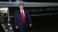 U.S. President Donald Trump walks on the South Lawn of the White House after arriving on Marine One in Washington, D.C., U.S., on Sunday, Aug. 9, 2020. A new poll suggests one in three Canadians have been keeping close tabs on the Jan. 6 hearings in the United States — and that three in four blame Trump for the riots. THE CANADIAN PRESS-Stefani Reynolds/Pool/ABACAPRESS.COM