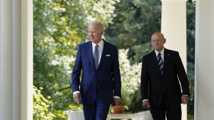 President Joe Biden walks with Bob Parant, Medicare beneficiary with Type 1 diabetes, as they arrive to speak at an event on health care costs, in the Rose Garden of the White House, Tuesday, Sept. 27, 2022, in Washington. (AP Photo/Susan Walsh)