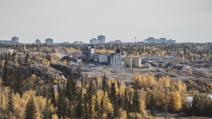 Yellowknife is seen in the distance during a site surface tour of the Giant Mine Remediation Project near Yellowknife on Wednesday, Sept. 21, 2022. THE CANADIAN PRESS/Angela Gzowski