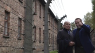 Arnold Schwarzenegger, right, and Simon Bergson, chairman of The Auschwitz Jewish Center Foundation visit Auschwitz - Birkenau Nazi German death camp in Oswiecim, Poland, Wednesday, Sept. 28, 2022. Film icon Schwarzenegger visited the site of the Nazi German death camp Auschwitz on Wednesday to send a message against hatred. The "Terminator" actor was given a tour of the site, viewing the barracks watchtowers and the remains of gas chambers that endure as evidence of the German extermination of Jews, Roma and others during World War II. (AP Photo/Michal Dyjuk)