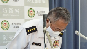 Yoshihide Yoshida, head of Japan’s Ground Self-Defense Force apologize during a news conference in Tokyo Thursday, Sept. 29, 2022. Yoshida apologized to a former soldier for her "pain" because of sexual harassment she was inflicted by a group of servicemembers. (Kyodo News via AP)