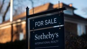 A real estate sale sign is shown in a west-end Toronto neighbourhood Saturday, March 7, 2020. THE CANADIAN PRESS/Graeme Roy 