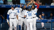 Toronto Blue Jays players are shown in this file photo. The Blue Jays clinched a playoff berth in the 2022 MLB playoffs on Sept. 29, 2022, following a Baltimore Orioles loss. 