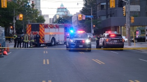 Toronto police are investigating a collision in the downtown area that sent two people to hospital. (Simon Sheehan/CP24)