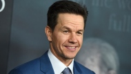 FILE - Mark Wahlberg arrives at the world premiere of "All the Money in the World" at the Samuel Goldwyn Theater on Monday, Dec. 18, 2017, in Beverly Hills, Calif. Wahlberg turns 51 on June 5. (Photo by Jordan Strauss/Invision/AP, File) 