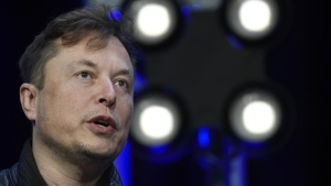 Tesla and SpaceX Chief Executive Officer Elon Musk speaks at the SATELLITE Conference and Exhibition in Washington on March 9, 2020.  (AP Photo/Susan Walsh, File)