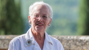 FILE - Denmark's Queen Margrethe attends a press conference at her Chateau de Caix residence near Cahors, southwestern France, Thursday, Aug.16, 2018. Denmark's popular monarch, Queen Margrethe II, has said that the 'strong reactions' to her decision to strip the royal titles from four of her grandchildren have affected her, sparking reports in the Danish press of tense relations within Europe's oldest ruling monarchy. (AP Photo/Fred Lancelot, File)