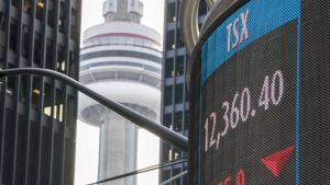 FILE - A sign board in Toronto displays the level of the TSX close on Monday March 16, 2020. THE CANADIAN PRESS/Frank Gunn