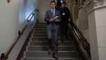 Prime Minister Justin Trudeau makes his way to caucus on Parliament Hill on Wednesday, October 5, 2022 in Ottawa. Trudeau says it is clear that Hockey Canada executives just don't get the seriousness of the situation the organization is facing. THE CANADIAN PRESS/Adrian Wyld
