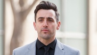 FILE - Canadian musician Jacob Hoggard arrives for his sex assault trial at the Toronto courthouse on Tuesday, May 10, 2022 in Toronto. THE CANADIAN PRESS/Cole Burston 