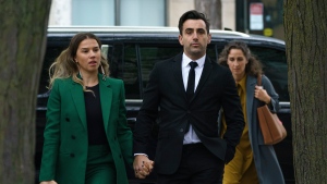 Canadian musician Jacob Hoggard and his wife, Rebekah Asselstine, arrive at court in Toronto on Thursday, Oct. 6, 2022. THE CANADIAN PRESS/Alex Lupul