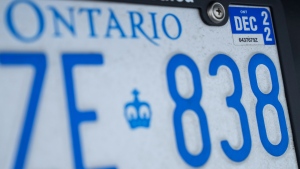 FILE - A photograph of an Ontario provincial licence plate with a renewal sticker is shown in Mississauga, Ont., on Tuesday, February 22, 2022. THE CANADIAN PRESS/Nathan Denette
