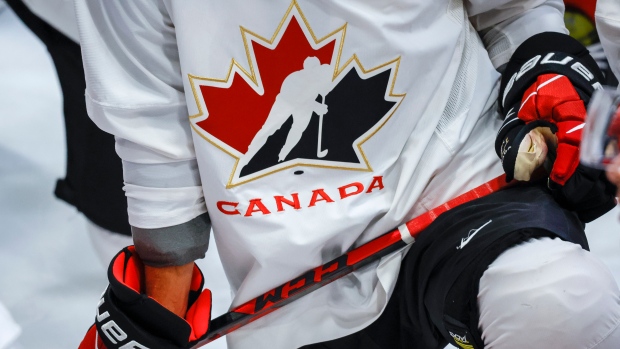 A Hockey Canada logo is shown on the jersey of a player with Canada’s National Junior Team during a training camp practice in Calgary, Tuesday, Aug. 2, 2022.THE CANADIAN PRESS/Jeff McIntosh 