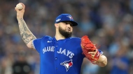 Toronto Blue Jays starting pitcher Alek Manoah (6) pitches against the Seattle Mariners during first inning American League wild card MLB postseason baseball action in Toronto on Friday, October 7, 2022. THE CANADIAN PRESS/Nathan Denette