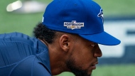 An MLB postseason logo is photographed on the side of Toronto Blue Jays outfielder Otto Lopez's (51) cap during practice, ahead of the team's wildcard series matchup against the Seattle Mariners in Toronto, Thursday, Oct. 6, 2022. THE CANADIAN PRESS/Alex Lupul