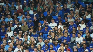 Fans watch as the Seattle Mariners take on the Toronto Blue Jays during ninth inning American League wild card MLB postseason baseball action in Toronto on Friday, October 7, 2022. THE CANADIAN PRESS/Nathan Denette