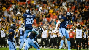 Toronto Argonauts defensive back Jamal Peters (3) celebrates after scoring a touchdown by intercepting a pass by Hamilton Tiger-Cats quarterback Dane Evans (9), during second half CFL football action in Toronto, on Friday, August 26, 2022.THE CANADIAN PRESS/Christopher Katsarov