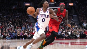 Philadelphia 76ers' Tyrese Maxey, left, drives past Toronto Raptors' Pascal Siakam during second half NBA basketball action in Toronto on Friday, October 28, 2022. THE CANADIAN PRESS/Chris You