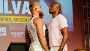 Jake Paul, left, and Anderson Silva