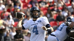Toronto Argonauts quarterback McLeod Bethel-Thompson (4) throws the ball during first half CFL football action against the Ottawa Redblacks, in Ottawa on Saturday, Sept. 10, 2022.League passing leader Bethel-Thompson and CFL outstanding player award winner Zach Collaros top the respective divisional all-star teams.THE CANADIAN PRESS/Justin Tang