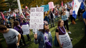 CUPE Ontario members and supporters demonstrate outside of the Queen's Park Legislative Building in Toronto, Friday, Nov. 4, 2022. THE CANADIAN PRESS/Cole Burston 