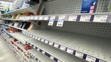 Empty shelves of children's pain relief medicine