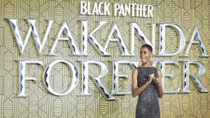 Letitia Wright poses for photographers upon arrival for the premiere of the film 'Black Panther: Wakanda Forever' in London, Thursday, Nov. 3, 2022. (Photo by Scott Garfitt/Invision/AP)