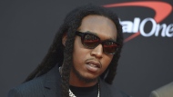 FILE - Takeoff, of Migos, arrives at the ESPY Awards in Los Angeles on July 10, 2019. A representative confirms that rapper Takeoff is dead after a shooting outside of a Houston bowling alley early Tuesday, Nov. 1, 2022. Takeoff, whose real name was Kirsnick Khari Ball, was part of Migos along with Quavo and Offset. He was 28. (Photo by Jordan Strauss/Invision/AP, File)