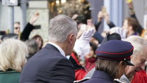 A protester, top left, throws eggs