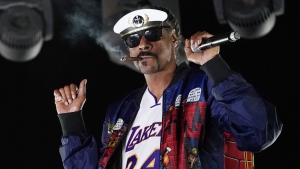 Snoop Dogg performs a DJ set as 'DJ Snoopadelic' during the "Concerts In Your Car" series on Friday, Oct. 2, 2020, in Ventura, Calif. (AP Photo/Chris Pizzello, File)