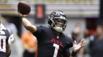 Atlanta Falcons quarterback Marcus Mariota throws a pass during the first half of an NFL football game against the Los Angeles Chargers, Sunday, Nov. 6, 2022, in Atlanta. (AP Photo/Butch Dill)