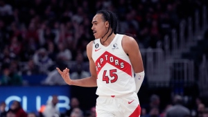 Toronto Raptors guard Dalano Banton (45) reacts after a three-point basket during the first half of an NBA basketball game against the Detroit Pistons, Monday, Nov. 14, 2022, in Detroit. (AP Photo/Carlos Osorio)