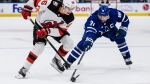 Toronto Maple Leafs centre John Tavares (91) challenges New Jersey Devils centre Jack Hughes (86) for the puck during third period NHL hockey action, in Toronto, Thursday, Nov. 17, 2022. THE CANADIAN PRESS/Christopher Katsarov
