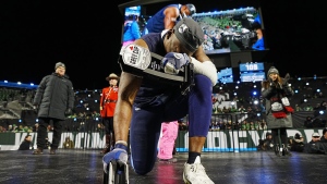 Toronto Argonauts linebacker Henoc Muamba celebrates after being named the Grey Cup's Most Valuable Player and Most Valuable Canadian after defeating the Winnipeg Blue Bombers in the 109th Grey Cup at Mosaic Stadium in Regina, Sunday, Nov. 20, 2022. THE CANADIAN PRESS/Jonathan Hayward