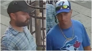 Two suspects wanted in connection with an assault with a weapon investigation are seen in this image. (Toronto Police Service)