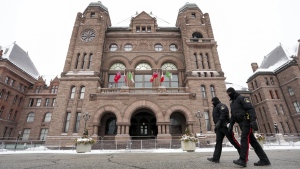 Legislature Protective Service members walk the perimeter at Queen's Park in Toronto on February 4, 2022. An Indigenous council is taking the Ontario government to court over changes made to online gaming. In a notice of application filed Monday against iGaming Ontario and the Attorney General of Ontario, the Mohawk Council of Kahnawa:ke alleges the changes are "illegal and unconstitutional" and leading to "significant" revenue loss to its community. THE CANADIAN PRESS/Nathan Denette