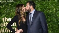 Adam Sandler, right, kisses Jackie Sandler at the Gotham Independent Film Awards at Cipriani Wall Street on Monday, Nov. 28, 2022, in New York. (Photo by Evan Agostini/Invision/AP)