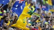 Australia's fans celebrate after winning the World Cup group D soccer match between Tunisia and Australia at the Al Janoub Stadium in Al Wakrah, Qatar, Saturday, Nov. 26, 2022. (AP Photo/Luca Bruno)