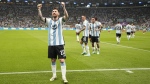 Argentina's Lionel Messi celebrates after scoring his side's opening goal during the World Cup group C soccer match between Argentina and Mexico, at the Lusail Stadium in Lusail, Qatar, Saturday, Nov. 26, 2022. (AP Photo/Ariel Schalit)